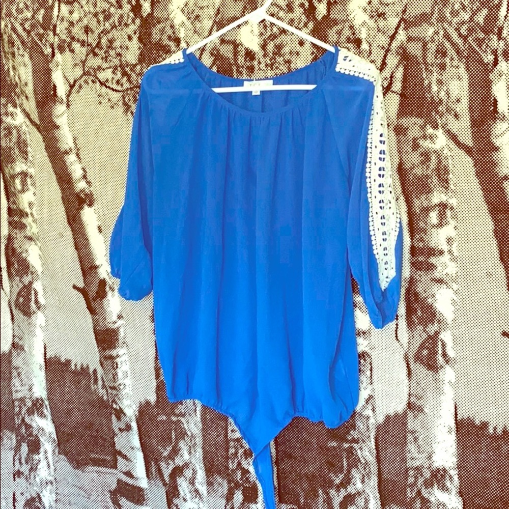 Blue shirt with crochet sleeve detail